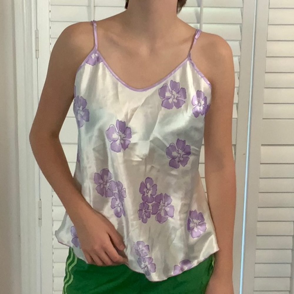 White Camisole with purple flowers. Gently worn. Size Medium